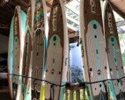 Paddle boards stacked together